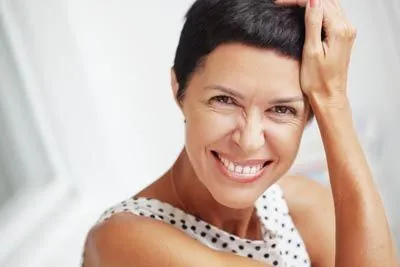 woman smiling after getting restorative dentistry care from Afdent in Mishawaka, IN