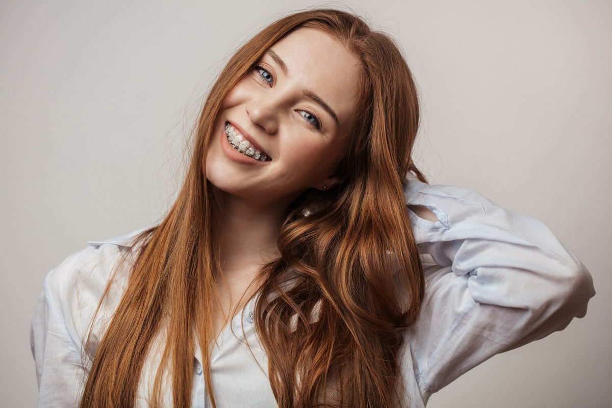 woman smiling after getting braces from Afdent in Mishawaka, IN